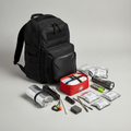 72-Hour Emergency Survival Kit contents laid out with tactical backpack